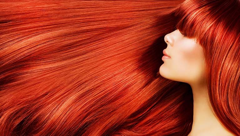 Image of Beautiful Red Hair free flowing with side profile face